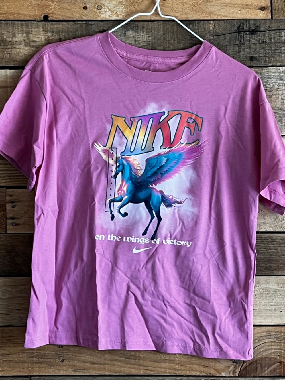 Nike Pink Graphic Tee with Blue Pegasus Print